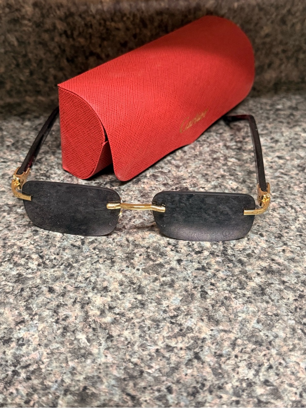 Gold Rimless Sunglasses with Black Lenses